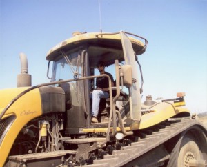 Terry Berries | William Terry, Ed's son and fifth generation farmer of Terry Farms, drives a tractor on one of the ranches